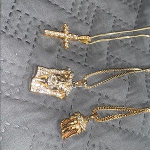 3 gold pendants included with chains